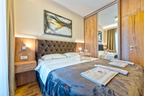 Postel nebo postele na pokoji v ubytování Apartman Luksuzni kutak - Prestige Forest Zlatibor