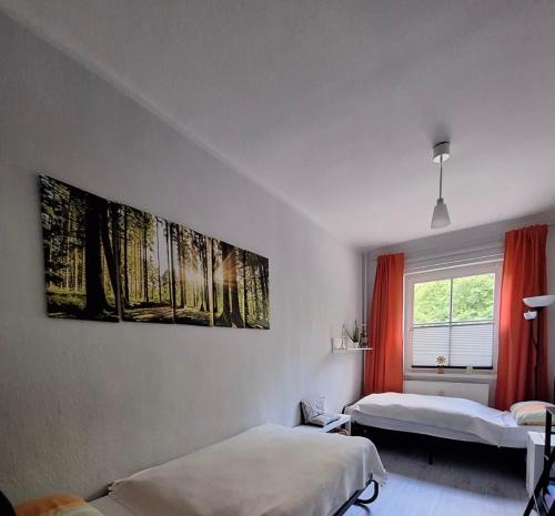 Postel nebo postele na pokoji v ubytování Das GrabenQuartier