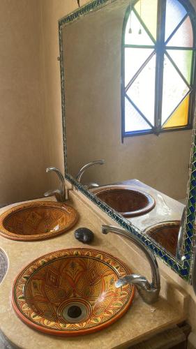 Ένα μπάνιο στο Villa M'Birika Maison d'hôtes