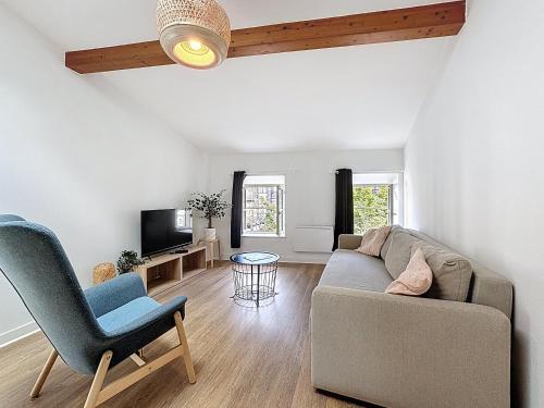 Télévision ou salle de divertissement dans l'établissement Tour d'Auvergne - Appartements en plein centre ville, proche de la cathédrale et de la place de Jaude
