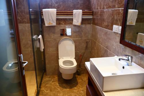Koupelna v ubytování Urban Park Suites Hotel