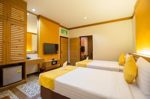 Katil atau katil-katil dalam bilik di Tee Pak Dee Resident Phuket