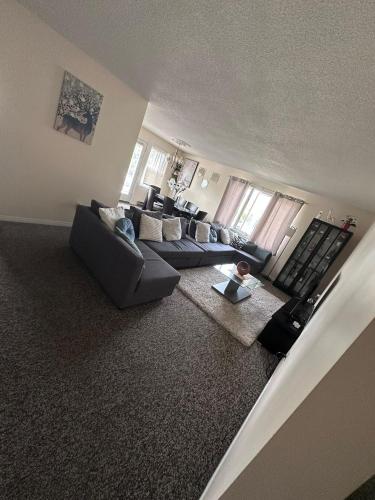an overhead view of a living room with couches at Maddy's Place in Oshawa
