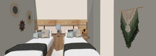 a group of beds in a room at BluMango Resort in Ierissos