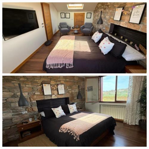 a bedroom with a large bed and a stone wall at Finca Gonzalez in Deva