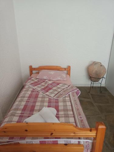 Ένα ή περισσότερα κρεβάτια σε δωμάτιο στο Τριώροφη εξοχική κατοικία Ελάνη