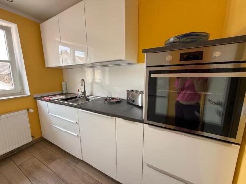 Η κουζίνα ή μικρή κουζίνα στο Ferienwohnung Seulberg 1 OG
