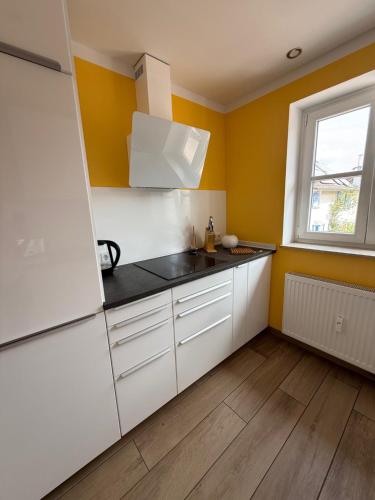 Η κουζίνα ή μικρή κουζίνα στο Ferienwohnung Seulberg 1 OG