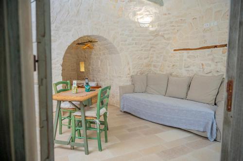 A bed or beds in a room at Charming Trulli