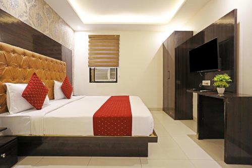 Voodi või voodid majutusasutuse P S Grand By Iconic Near Delhi International Airport toas