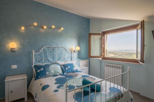 Postel nebo postele na pokoji v ubytování BellaVista B&B