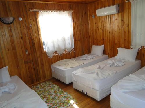 Кровать или кровати в номере Korsan Pension