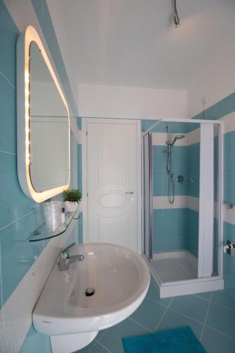 a bathroom with a sink and a shower at BellaVista B&B in Vasto