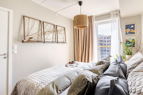 Katil atau katil-katil dalam bilik di Quiet luxury in the heart of Oslo