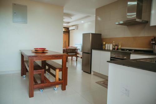 Η κουζίνα ή μικρή κουζίνα στο Sunset Apartments at Fumba Uptown