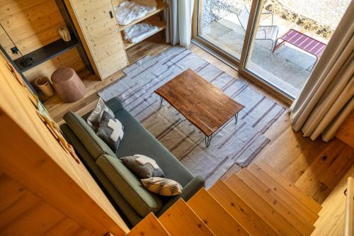 an overhead view of a living room with a couch at MAD Retreat Hotel in Nendaz