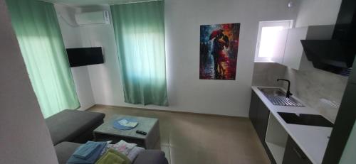 Una televisión o centro de entretenimiento en Villa Grafenberg Ulcinj