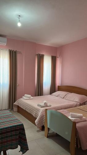 Ένα ή περισσότερα κρεβάτια σε δωμάτιο στο Armela Guest House