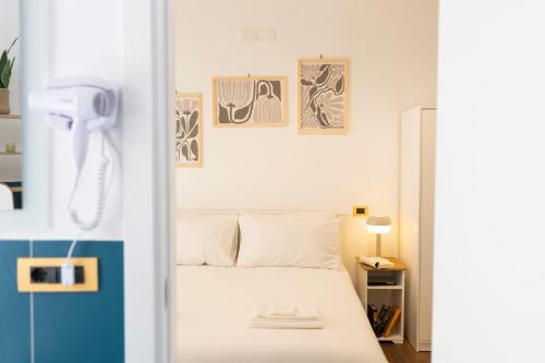 Postel nebo postele na pokoji v ubytování Mare nel Cuore Rooms Salerno
