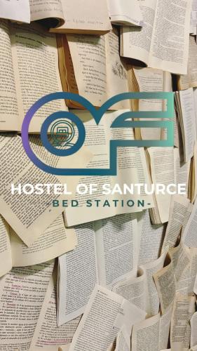 a pile of books with the words house of science ed institution at Hostel of Santurce in San Juan