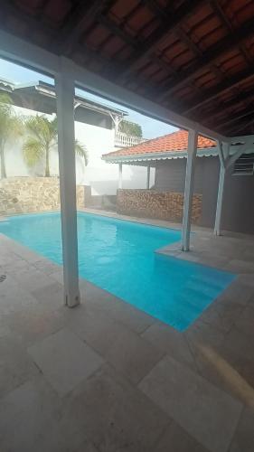 Bazén v ubytování Lumineux Duplex SANDÌA nebo v jeho okolí