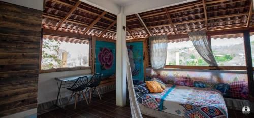 Ένα ή περισσότερα κρεβάτια σε δωμάτιο στο Casa Mazunteña