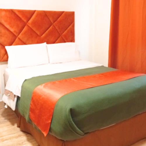 Ένα ή περισσότερα κρεβάτια σε δωμάτιο στο Hotel Soul Mate Inn
