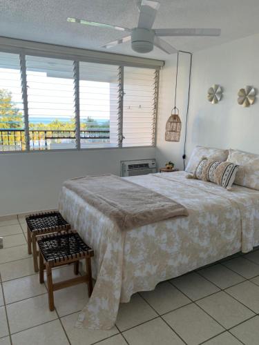 Voodi või voodid majutusasutuse Luquillo Beach & Ocean Breeze toas