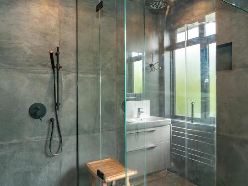 a bathroom with a glass shower and a sink at Country Home in Idyllic South Downs - Views, Free Parking for 7 cars, Play room, Steam room, Fire Pit and more in Kingston near Lewes