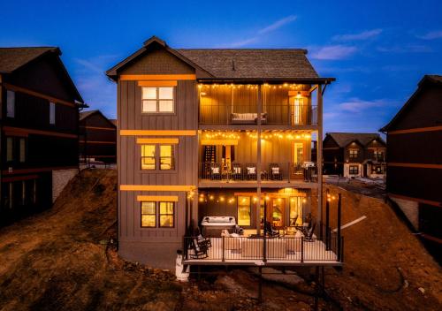 a large house with lights on top of it at Homestead Bluff in Sevierville
