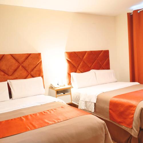 Ένα ή περισσότερα κρεβάτια σε δωμάτιο στο Hotel Soul Mate Inn