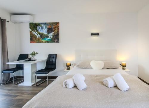Postel nebo postele na pokoji v ubytování Guest House Mačić
