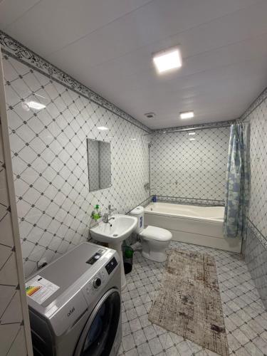 Koupelna v ubytování Oʻzbegim