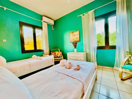 Ένα ή περισσότερα κρεβάτια σε δωμάτιο στο Anemeli Coastal Retreat Stoupa