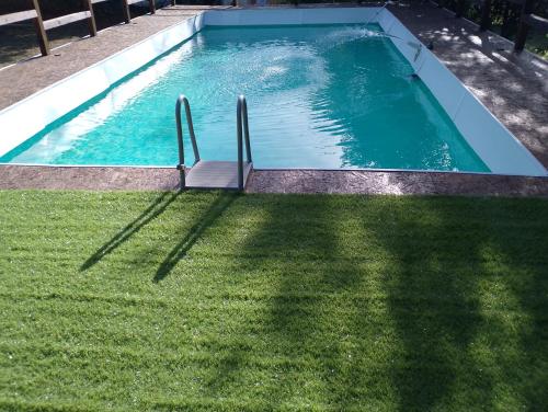 Πισίνα στο ή κοντά στο La Casetta Nel Bosco Delle Nereidi