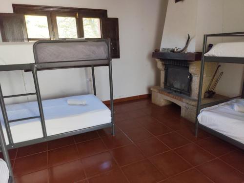 Ένα ή περισσότερα κρεβάτια σε δωμάτιο στο La Casita