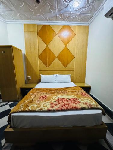 Кровать или кровати в номере Comfort Rezidor Guest House