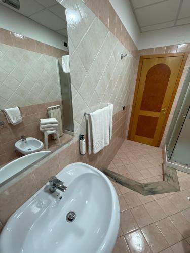 Ένα μπάνιο στο Hotel Toscano
