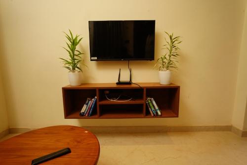 TV a/nebo společenská místnost v ubytování LA VILLA Resort