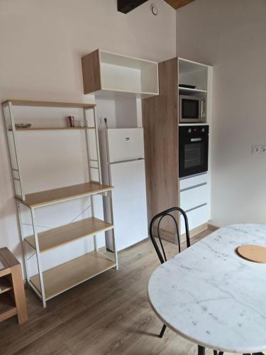 Η κουζίνα ή μικρή κουζίνα στο Appartement Grésival