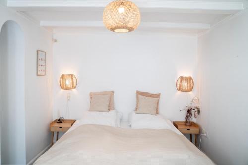 Postel nebo postele na pokoji v ubytování Villa med havudsigt og privat sauna