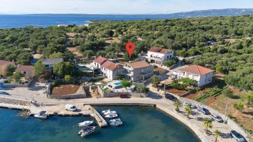 an aerial view of a house with a marina at Luxury apartments Lun in Lun