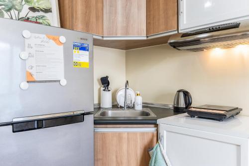 Kuchyň nebo kuchyňský kout v ubytování Virgo Nest Rentals - Avida Riala IT Park - City View