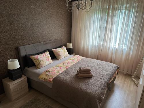 Postel nebo postele na pokoji v ubytování Just Apartments