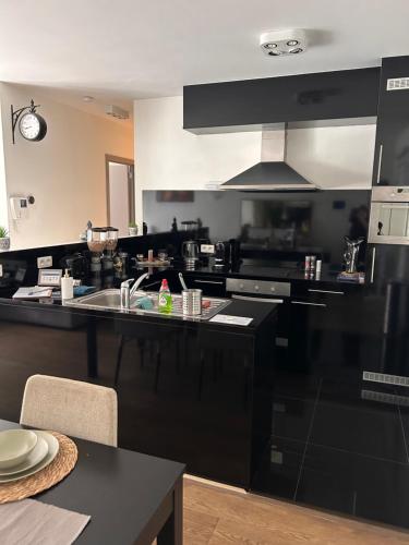Kuchyň nebo kuchyňský kout v ubytování BnB Antwerp Centrum