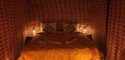 Cama o camas de una habitación en Erg Chigaga Luxury Camp