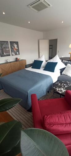 Ένα ή περισσότερα κρεβάτια σε δωμάτιο στο TheArtApart Hannover-Design-Messe-Parken-Fitness