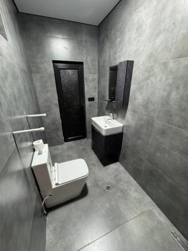 Koupelna v ubytování Ninoshvili str Apartments