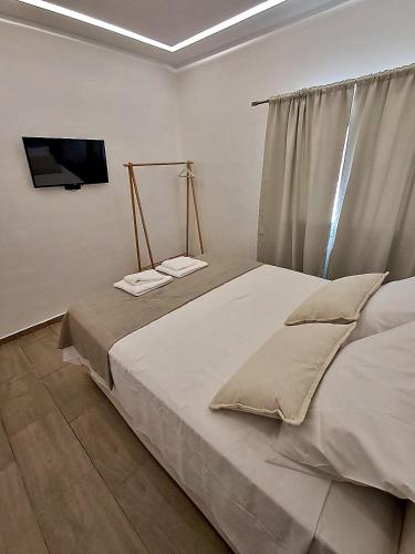 Ένα ή περισσότερα κρεβάτια σε δωμάτιο στο Modern elegant escape on the Ionian coast, near Ancient Olympia