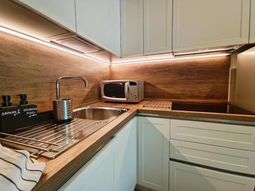 Kuchyň nebo kuchyňský kout v ubytování Casa Brunello